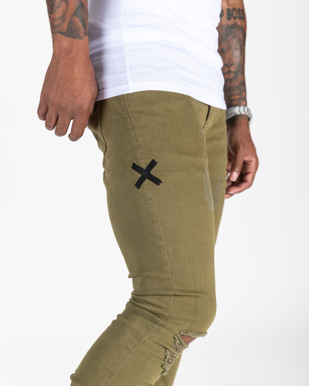Olive distressed stack denims