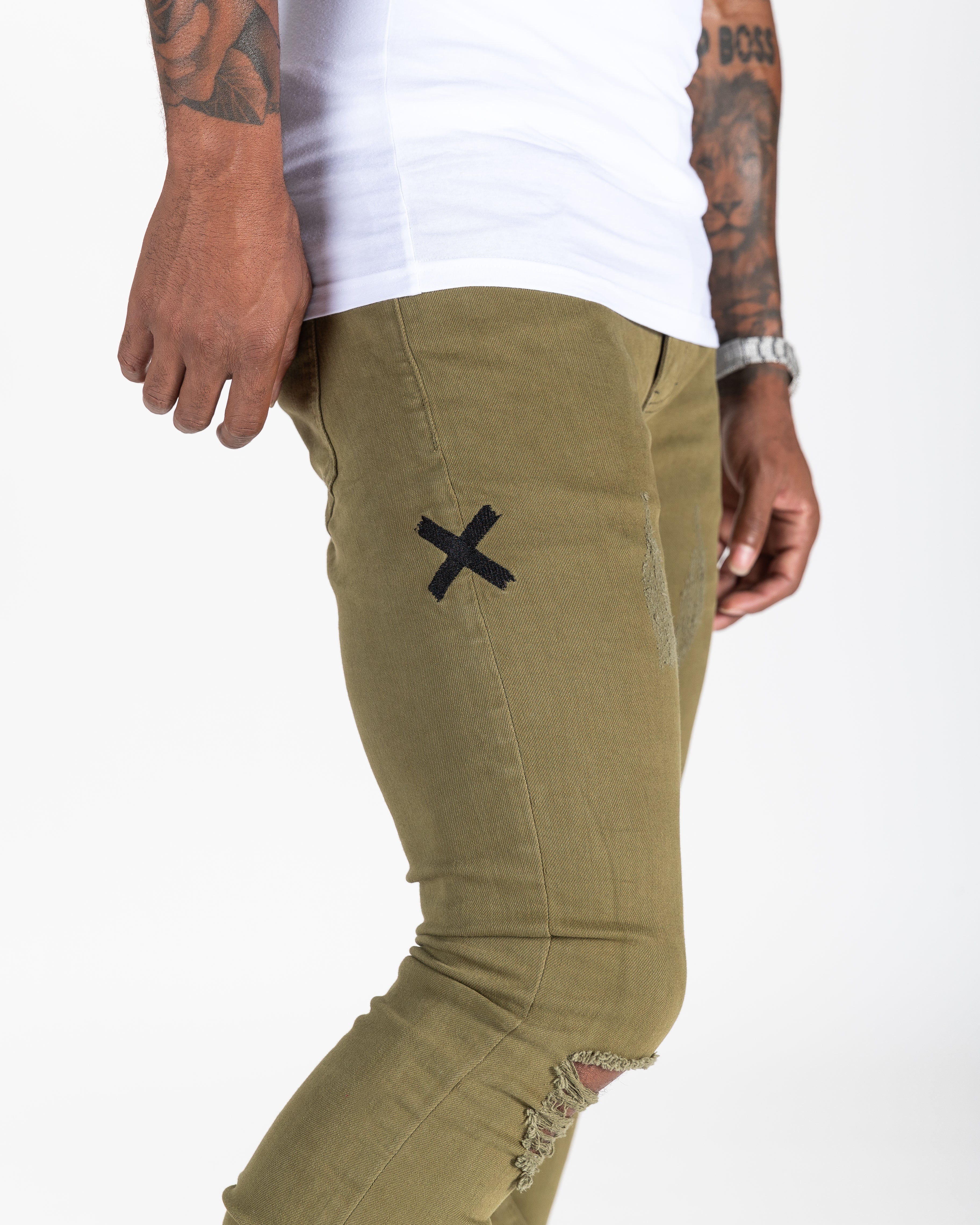 Olive distressed stack denims
